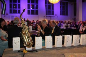 A Light to Remember candles with saxophone